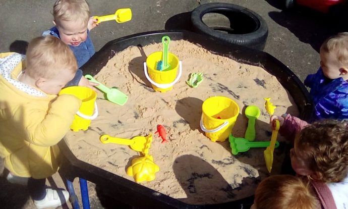 Butterflies children in the sand