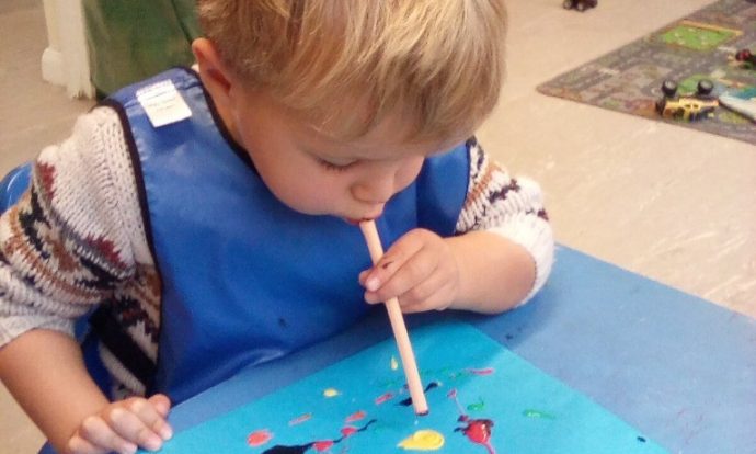 Child making firework art
